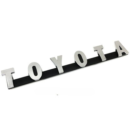GENUINE OEM TOYOTA 69-74 LAND CRUISER FJ40 FRONT GRILLE PANEL EMBLEM 75321-60010