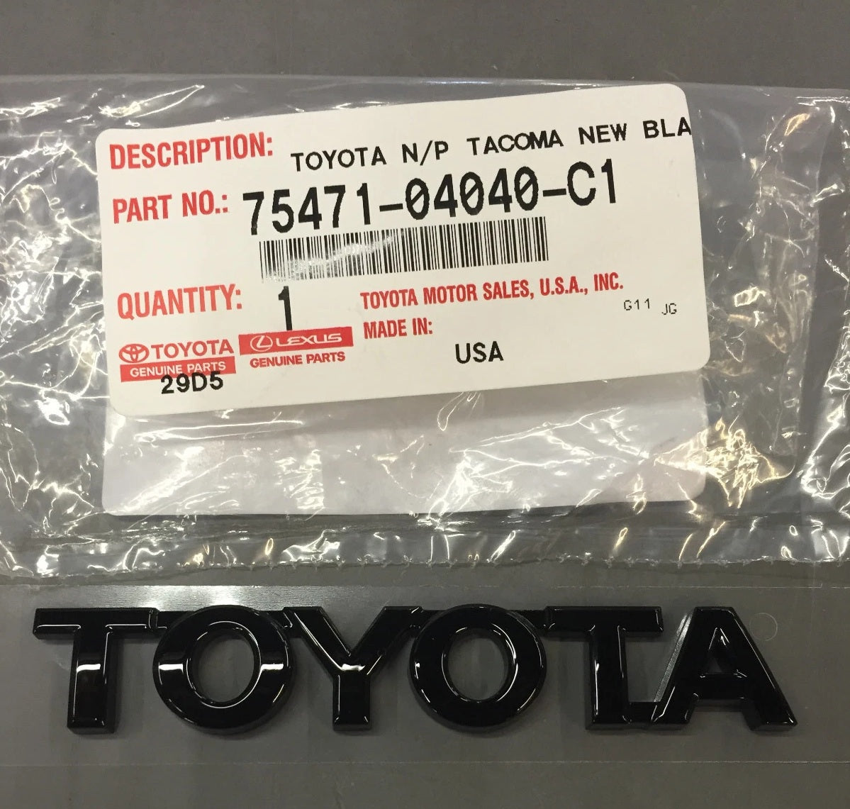 Toyota ONYX BLACK Emblem Genuine TOYOTA OEM 75471-04040-C1