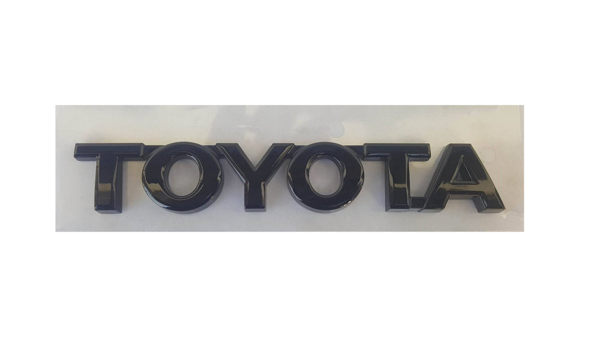Toyota ONYX BLACK Emblem Genuine TOYOTA OEM 75471-04040-C1