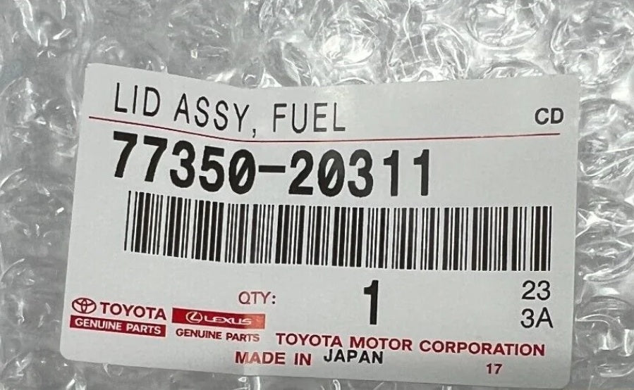 NEW GENUINE TOYOTA 2000-2005 CELICA FUEL DOOR, LID ASSEMBLY 77350-20311